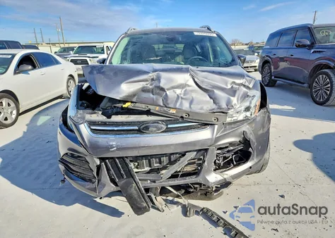 2014 Ford Escape Titanium z USA, uszkodzony, nr VIN 1FMCU9JX6EUD99722